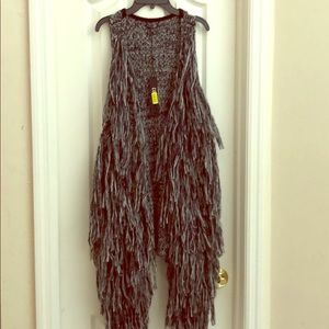 A down to your knees vest.